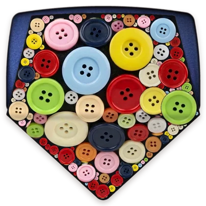 A rolled necktie covered in bright buttons of many sizes