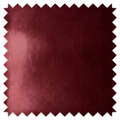 A swatch of plain maroon velvet with pinked edges